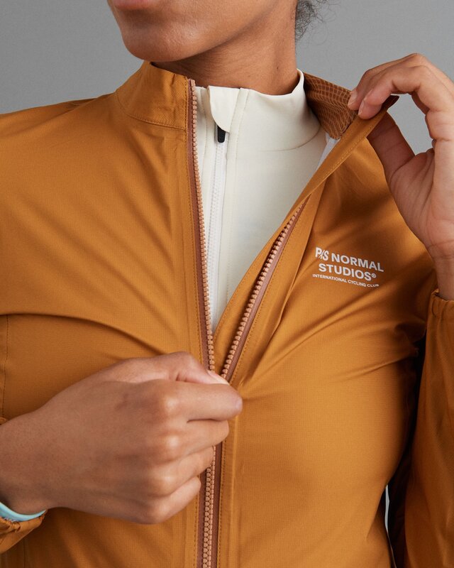 Pas Normal Studios Women&#39;s Mechanism Pertex Rain Jacket - Burned Orange